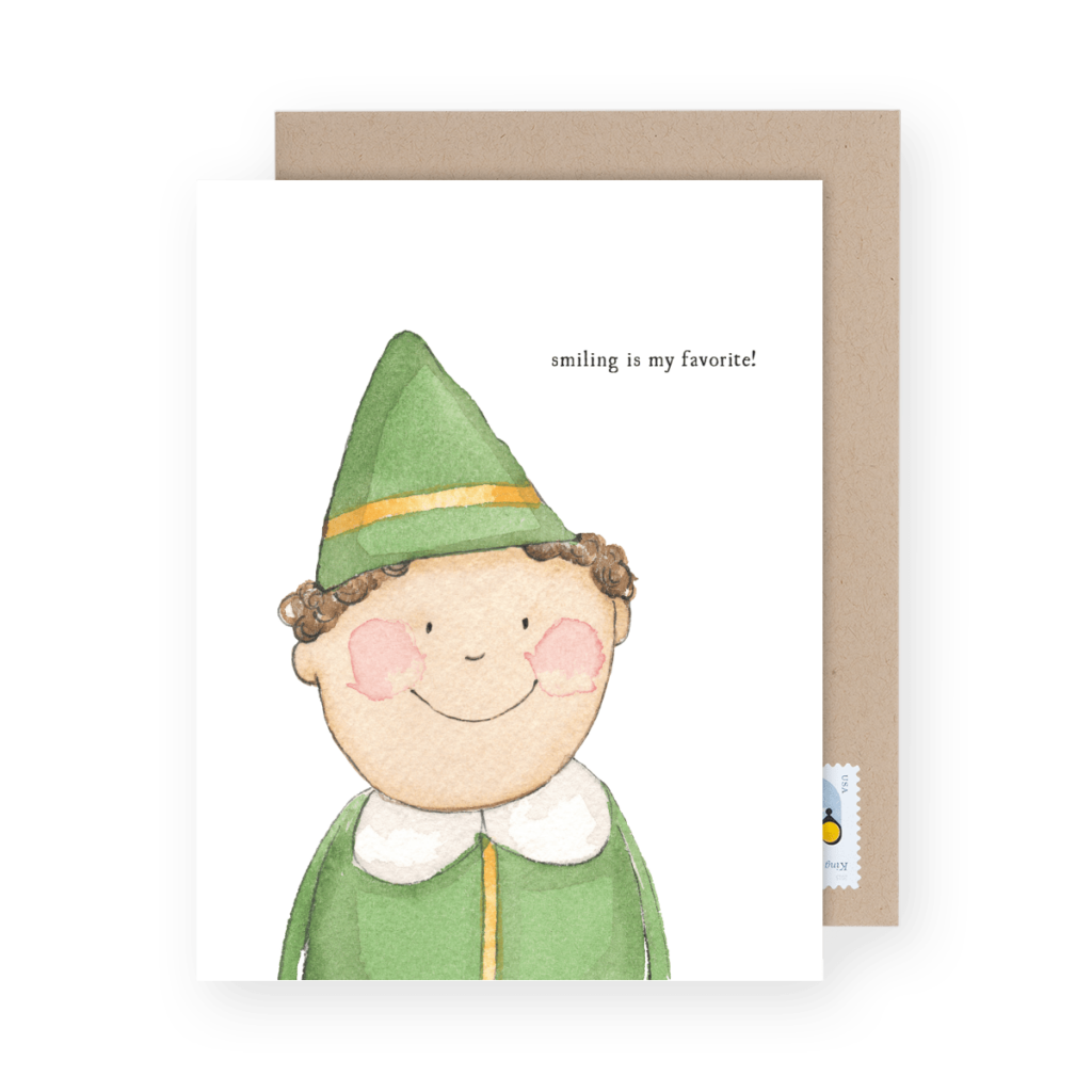 Illustrated card with a smiling figure wearing a green elf-like hat and suit, with the text "smiling is my favorite!" on a plain white background.