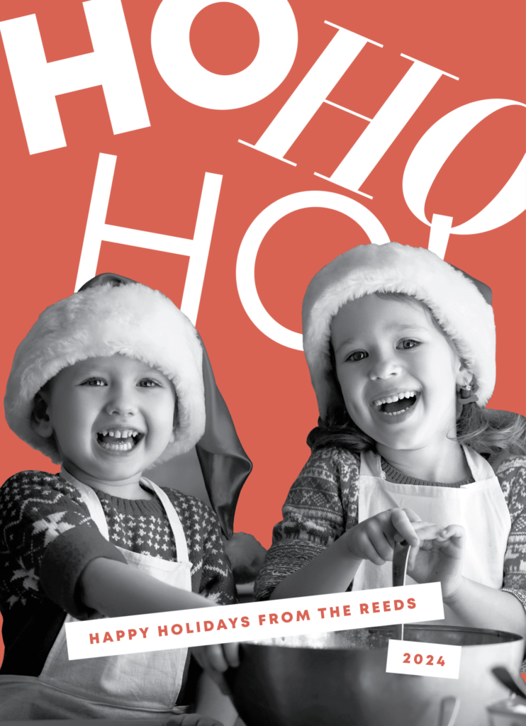 Two children wearing Santa hats and aprons smile while baking. Text reads "HO HO HO" and "Happy Holidays from the Reeds 2024.