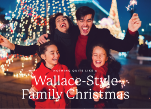 A joyful group of four people celebrate outdoors with sparklers, surrounded by festive Christmas lights.