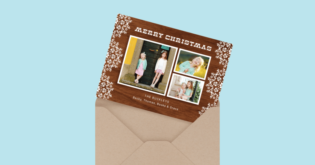 Two kids standing on their stoop for their Christmas photos.