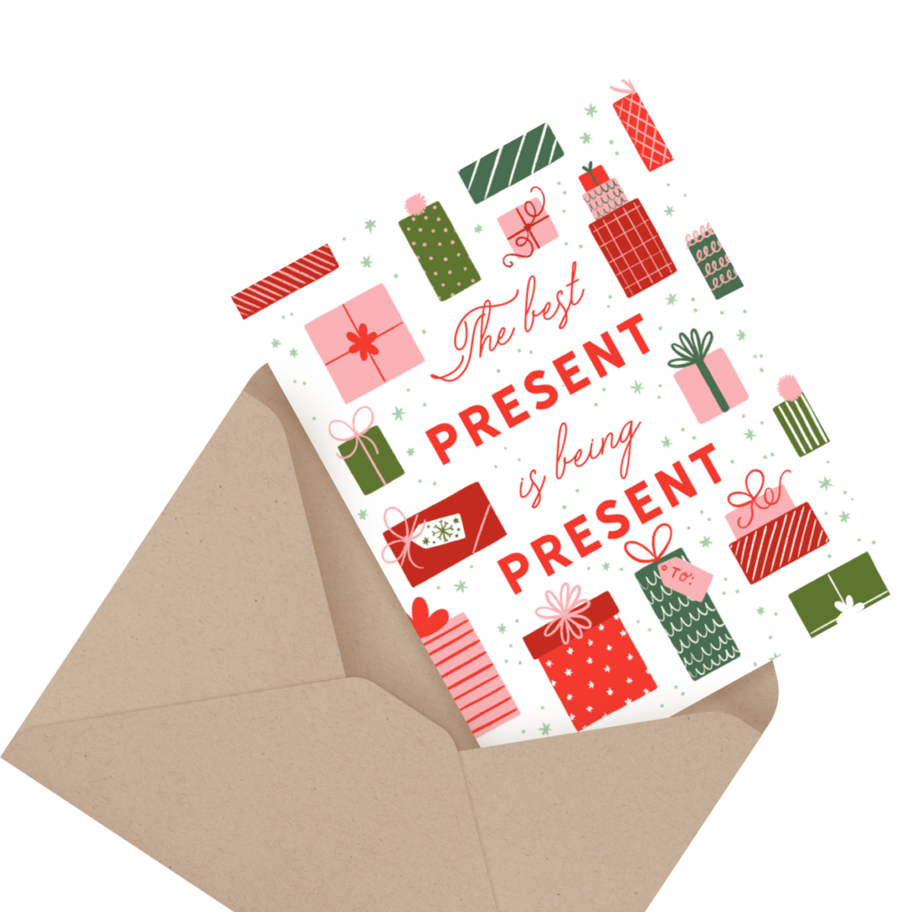 Greeting card with festive gift illustrations and the quote "The best PRESENT is being PRESENT," in an open envelope.