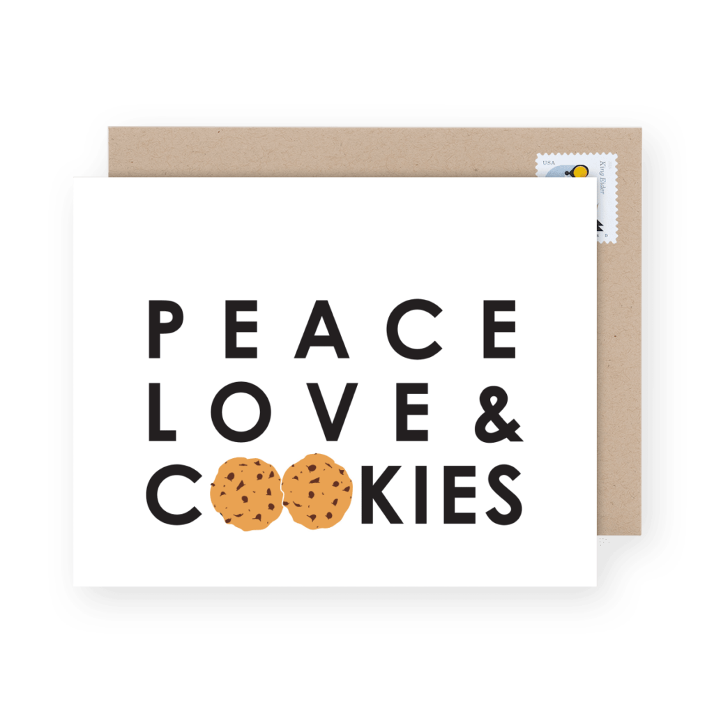 Greeting card with text "Peace Love & Cookies," featuring two cookies as the letter "O" in "Cookies," alongside a brown envelope with a stamp.