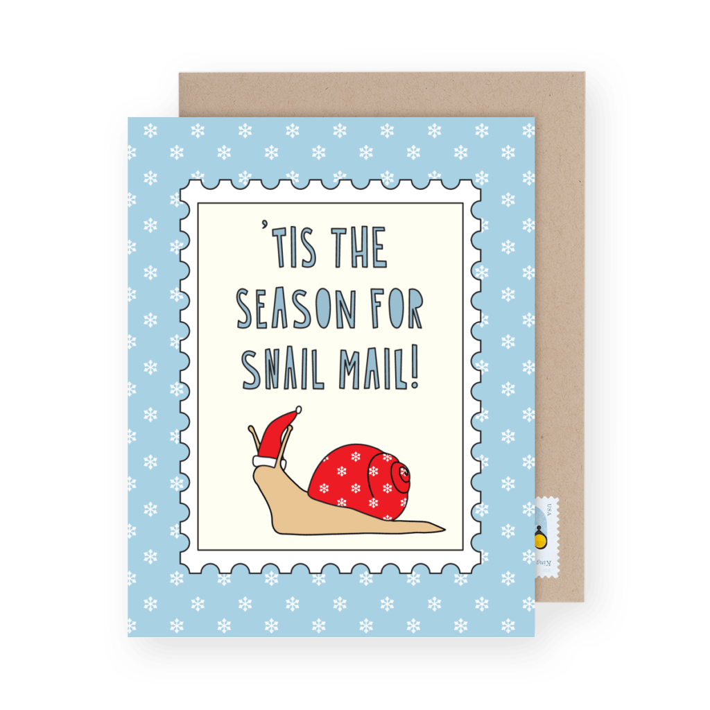 Greeting card with a cartoon snail wearing a red Santa hat and text reading, "'Tis the season for snail mail!" on a snowflake-patterned background.