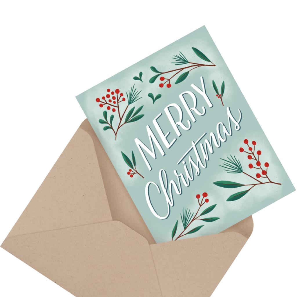 A Christmas card with "Merry Christmas" in white text, featuring red berries and green leaves, partially inserted into a brown envelope.